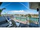 Balcony featuring water views and rocking chairs at 199 21St Ave, St Pete Beach, FL 33706
