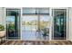 Inviting balcony features tile floors and a picturesque water view at 199 21St Ave, St Pete Beach, FL 33706