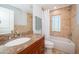 Well-lit bathroom featuring granite counters, neutral tile, and a bathtub-shower combination at 199 21St Ave, St Pete Beach, FL 33706