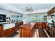 Modern kitchen with stainless steel appliances opens to a large deck area at 199 21St Ave, St Pete Beach, FL 33706