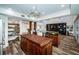Well-appointed kitchen and center island flow to the living area at 199 21St Ave, St Pete Beach, FL 33706