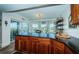 Beautiful kitchen features granite countertops and balcony access with a view at 199 21St Ave, St Pete Beach, FL 33706