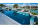 Beautiful waterfront pool with stunning harbor views, perfect for enjoying sunny days and boats passing by at 199 21St Ave, St Pete Beach, FL 33706