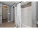 Bathroom highlighting shower/tub with white tile, and a walk-in closet at 2010 E Palm Ave # 14206, Tampa, FL 33605