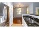 Kitchen with stainless steel appliances, granite countertops, and adjacent dining area at 2010 E Palm Ave # 14206, Tampa, FL 33605