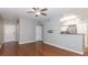 Hardwood floors and open-concept space define this welcoming living room at 2010 E Palm Ave # 14206, Tampa, FL 33605