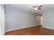 The living room features hardwood floors, neutral walls and a ceiling fan with lights at 2010 E Palm Ave # 14206, Tampa, FL 33605