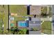 Bird's eye aerial view of backyard with pool and neighborhood at 2851 16Th N Ave, St Petersburg, FL 33713