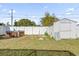 The backyard features a large storage shed, a hot tub, and a fenced perimeter at 2851 16Th N Ave, St Petersburg, FL 33713