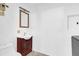 A bathroom with a single sink vanity and neutral paint at 2851 16Th N Ave, St Petersburg, FL 33713