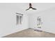 Bedroom featuring a window, door to the back yard and ceiling fan at 2851 16Th N Ave, St Petersburg, FL 33713