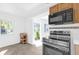 Bright kitchen with stainless steel appliances, and light wood cabinetry at 2851 16Th N Ave, St Petersburg, FL 33713