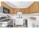 Bright kitchen featuring modern stainless steel appliances, white countertops and light wood cabinetry at 2851 16Th N Ave, St Petersburg, FL 33713