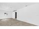 Spacious living room featuring tile floor, window, and sliding barn door at 2851 16Th N Ave, St Petersburg, FL 33713