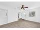 A cozy living room boasts built in shelving and neutral paint at 2851 16Th N Ave, St Petersburg, FL 33713