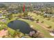 Home is located on a golf course community with pond views at 29318 Whipporwill Ln, Wesley Chapel, FL 33543