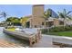 Spacious backyard with dock access and a patio area perfect for outdoor seating near the water at 4900 59Th S Ave, St Petersburg, FL 33715