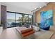 Bright living room with water views, modern seating, and a modern area rug at 4900 59Th S Ave, St Petersburg, FL 33715