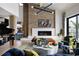 Spacious living room boasts a grand piano, modern fireplace, high ceilings, and stylish furniture at 4900 59Th S Ave, St Petersburg, FL 33715