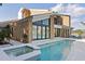 Backyard pool and spa with waterfront views, providing a perfect outdoor retreat at 4900 59Th S Ave, St Petersburg, FL 33715