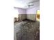 Bedroom with damaged floors and walls down to the studs at 602 Danube Ave, Tampa, FL 33606