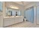 Bright bathroom featuring double vanity, ample counter space and walk-in shower at 603 S Sylvan Dr, Brandon, FL 33510