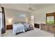 Bright bedroom featuring neutral decor and a ceiling fan at 603 S Sylvan Dr, Brandon, FL 33510