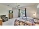 Comfortable bedroom with neutral decor and ceiling fan at 603 S Sylvan Dr, Brandon, FL 33510