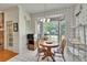 Sunlit breakfast nook features a bay window with a view, a table, and chairs, perfect for relaxed dining at 603 S Sylvan Dr, Brandon, FL 33510