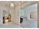 Bright living room with tile flooring transitioning into a room with hardwood flooring at 603 S Sylvan Dr, Brandon, FL 33510