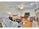 Spacious living room with hardwood floors, fireplace, and neutral-toned furniture at 603 S Sylvan Dr, Brandon, FL 33510
