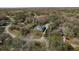 A lovely home is nestled amongst the trees, just off a quiet street at 6615 Ridge Top Dr, Trinity, FL 34655