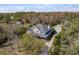 Stunning home featuring a spacious front porch and mature landscaping at 6615 Ridge Top Dr, Trinity, FL 34655