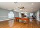 Expansive game room with a pool table, multiple ceiling fans, and bright natural light at 6615 Ridge Top Dr, Trinity, FL 34655
