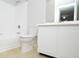 Bathroom featuring shower/tub combination, toilet, and vanity with a mirror at 10263 Gandy N Blvd # 105, St Petersburg, FL 33702