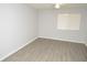 Bright bedroom with ceiling fan and a large window for ample natural light at 10263 Gandy N Blvd # 105, St Petersburg, FL 33702