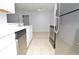 Bright kitchen featuring stainless steel appliances and ample countertop space at 10263 Gandy N Blvd # 105, St Petersburg, FL 33702