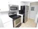 Modern kitchen featuring stainless steel appliances and ample counter space at 10263 Gandy N Blvd # 105, St Petersburg, FL 33702