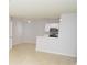 Open-concept room with tile flooring and modern lighting at 10263 Gandy N Blvd # 105, St Petersburg, FL 33702