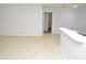 Bright living room featuring a window and tile flooring at 10263 Gandy N Blvd # 105, St Petersburg, FL 33702