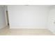 Living room with tile flooring and white walls at 10263 Gandy N Blvd # 105, St Petersburg, FL 33702