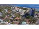 Aerial view showcases the neighborhood, beach, and water views at 1036 N Shore Ne Dr # 5, St Petersburg, FL 33701