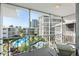 Balcony overlooking a pool and complex buildings at 1036 N Shore Ne Dr # 5, St Petersburg, FL 33701