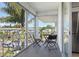 Cozy balcony features a seating area and offers an open view of the neighborhood at 1036 N Shore Ne Dr # 5, St Petersburg, FL 33701