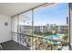Balcony overlooking a pool and complex buildings at 1036 N Shore Ne Dr # 5, St Petersburg, FL 33701