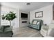 Comfortable living space with natural light and a modern fireplace at 1036 N Shore Ne Dr # 5, St Petersburg, FL 33701