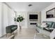 Bright living area features a fireplace and access to the outdoors at 1036 N Shore Ne Dr # 5, St Petersburg, FL 33701