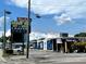 The Press Box Sports Emporium & Eatery, Tampa, exterior showcasing its signage against a partly cloudy sky at 11248 Andy Dr, Riverview, FL 33569