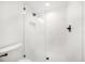 Walk-in shower with a tiled shower and a glass door at 1125 Fairwood Ave, Clearwater, FL 33759