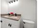 Bathroom features a double sink vanity and modern fixtures at 1125 Fairwood Ave, Clearwater, FL 33759